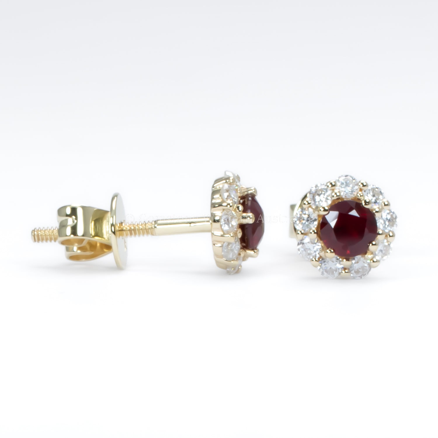 contrast of side and front view of ruby studs in white background
