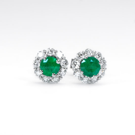 Colombian Emerald earrings in white background