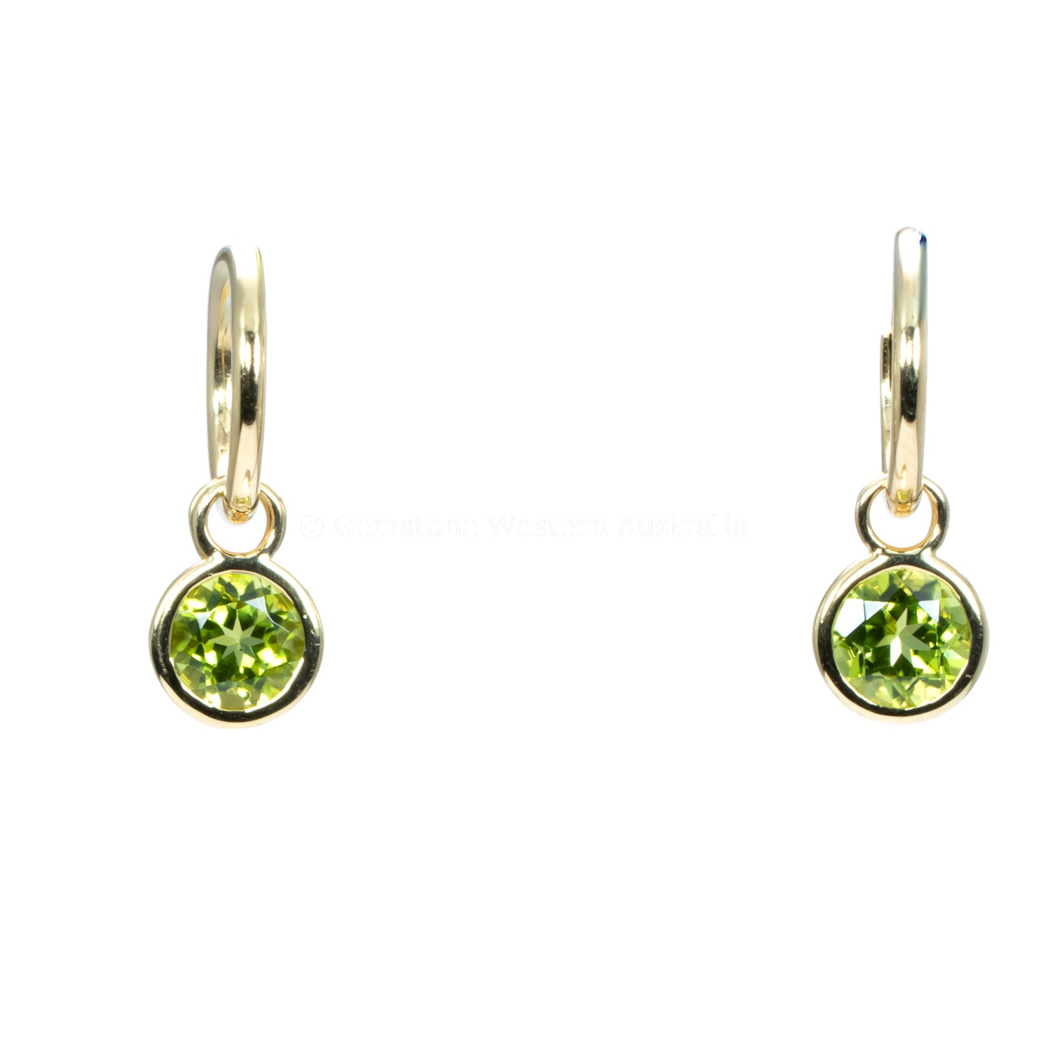 front view of peridot earrings in yellow gold in white background