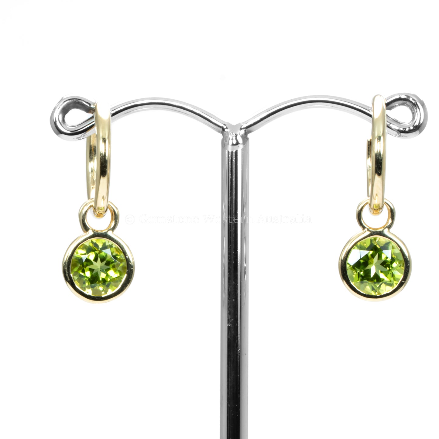 front view of peridot earrings in yellow gold
