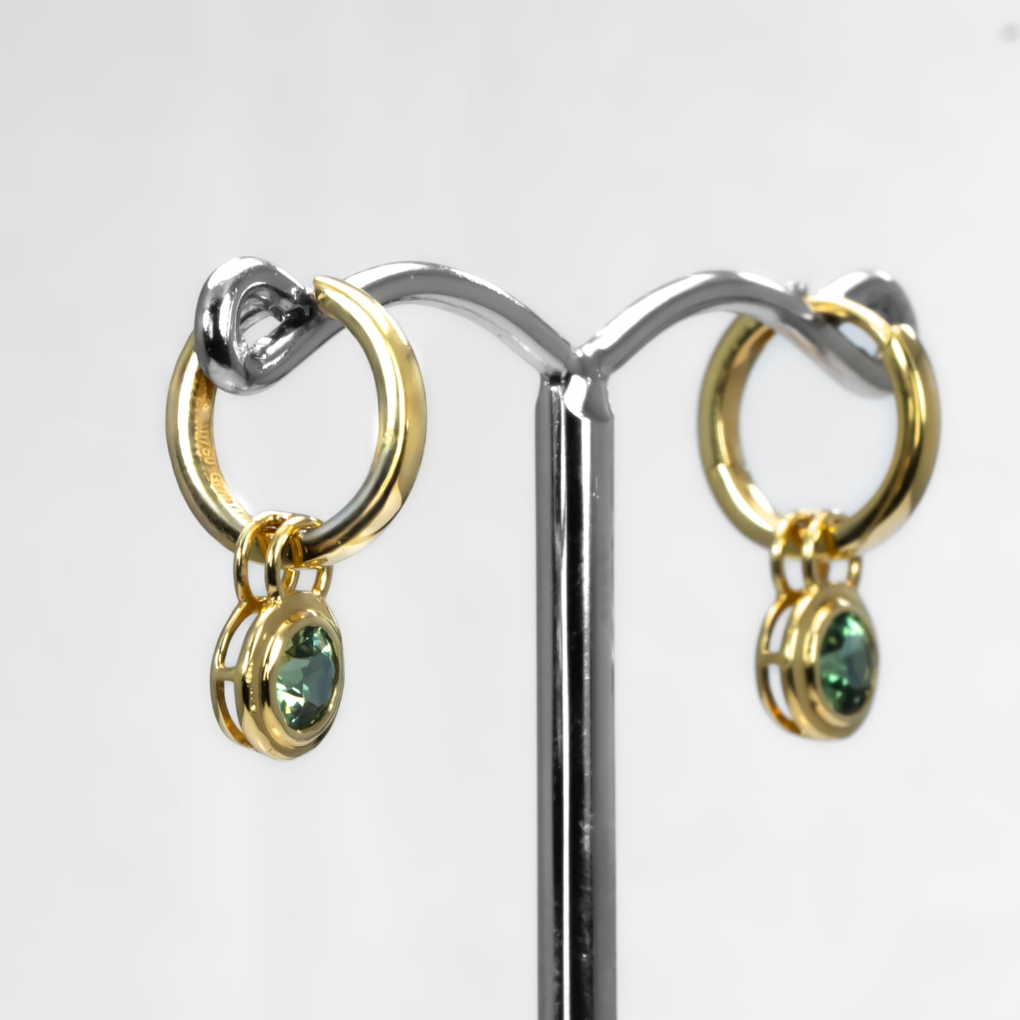 side view of Australian sapphires dangling earrings in 18K gold 