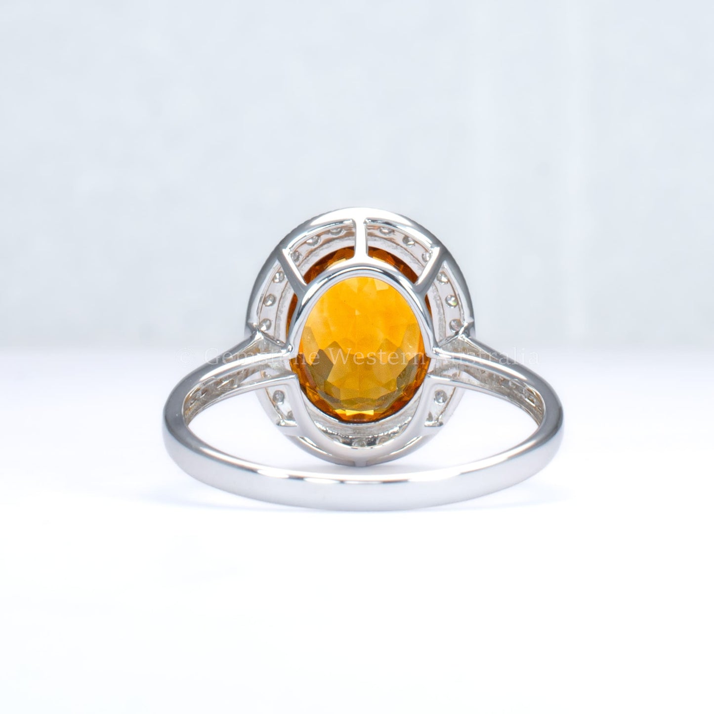Oval-Cut Citrine Ring with Diamond Halo in 18K White Gold