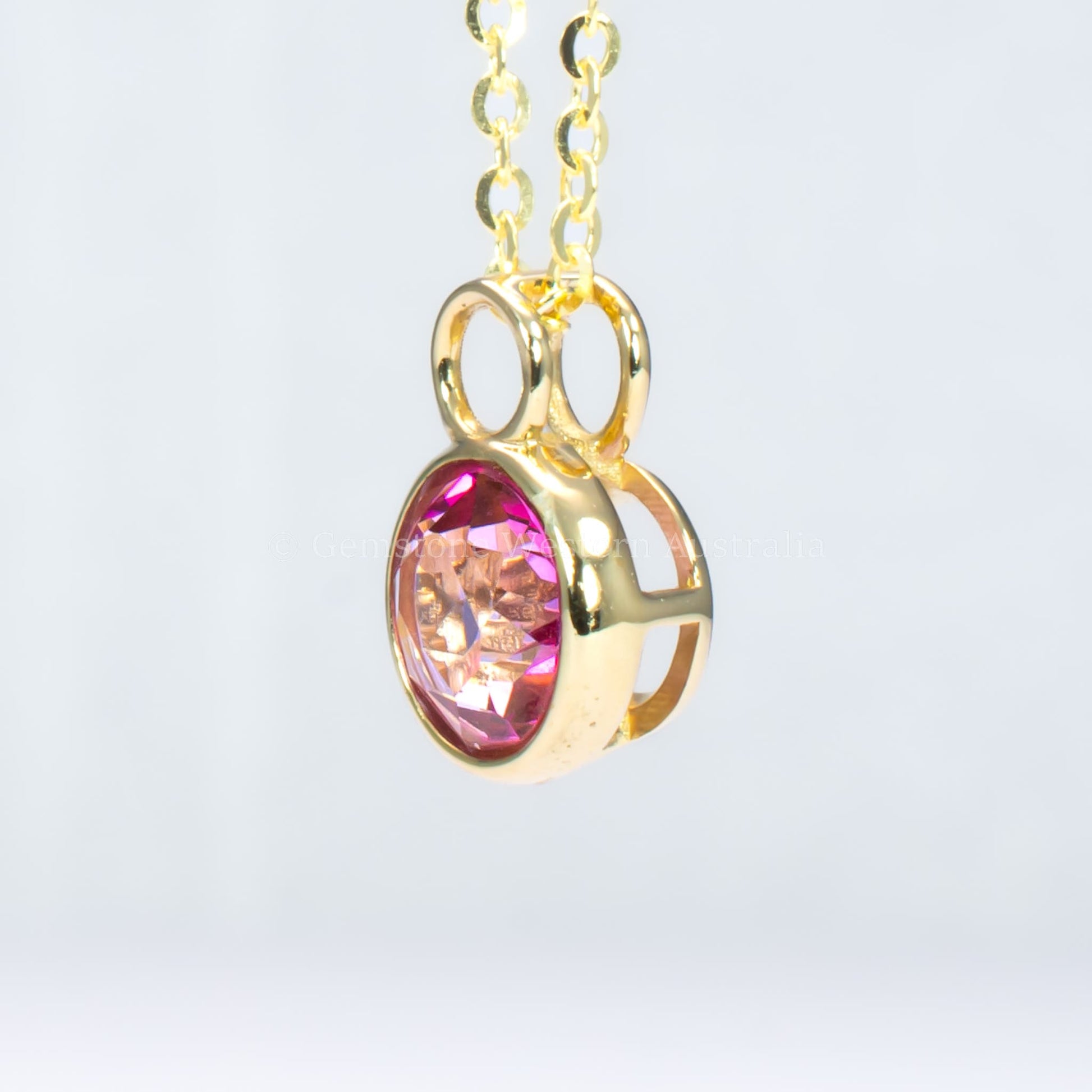 Round Pink Topaz Pendant in 14K Yellow Gold