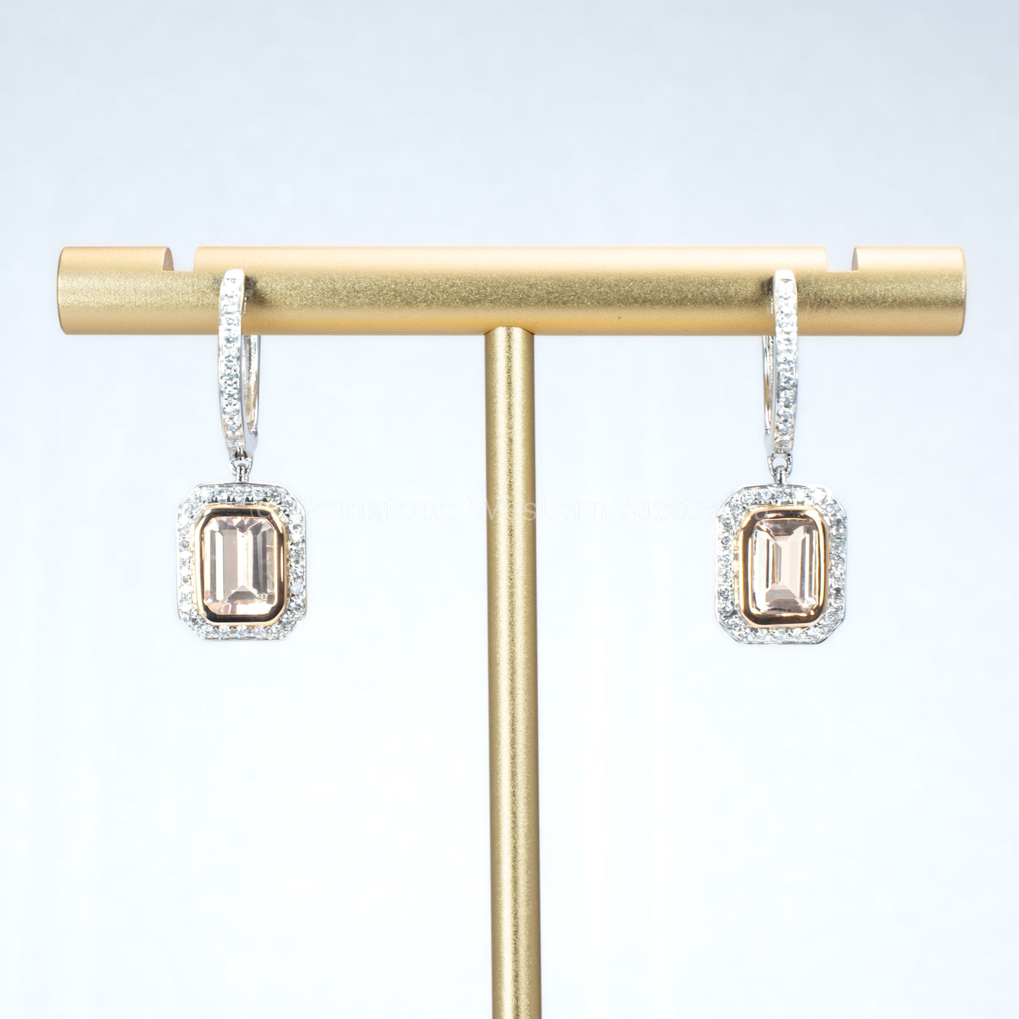 morganite and diamonds gold earrings in light gray background