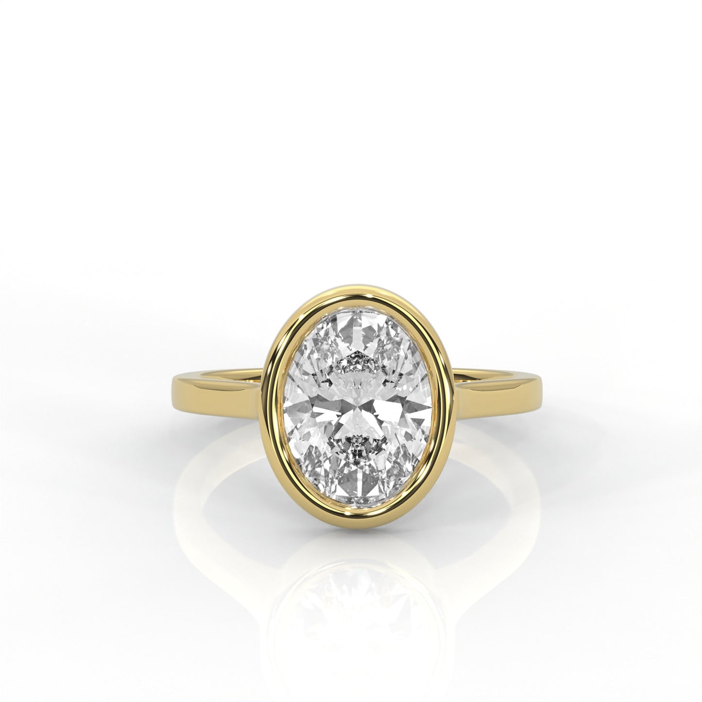 Gold bezel set ring with an Oval  diamond on a white background