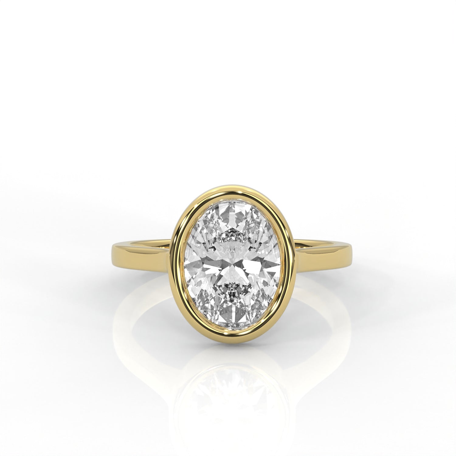 Gold bezel set ring with an Oval  diamond on a white background