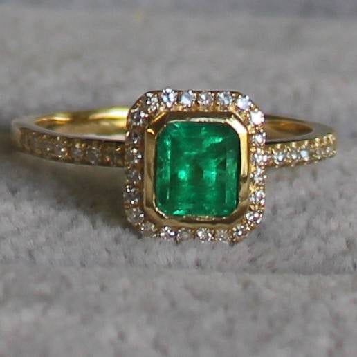 18ct Yellow Gold Colombian Emerald and 40 Diamonds Ring.