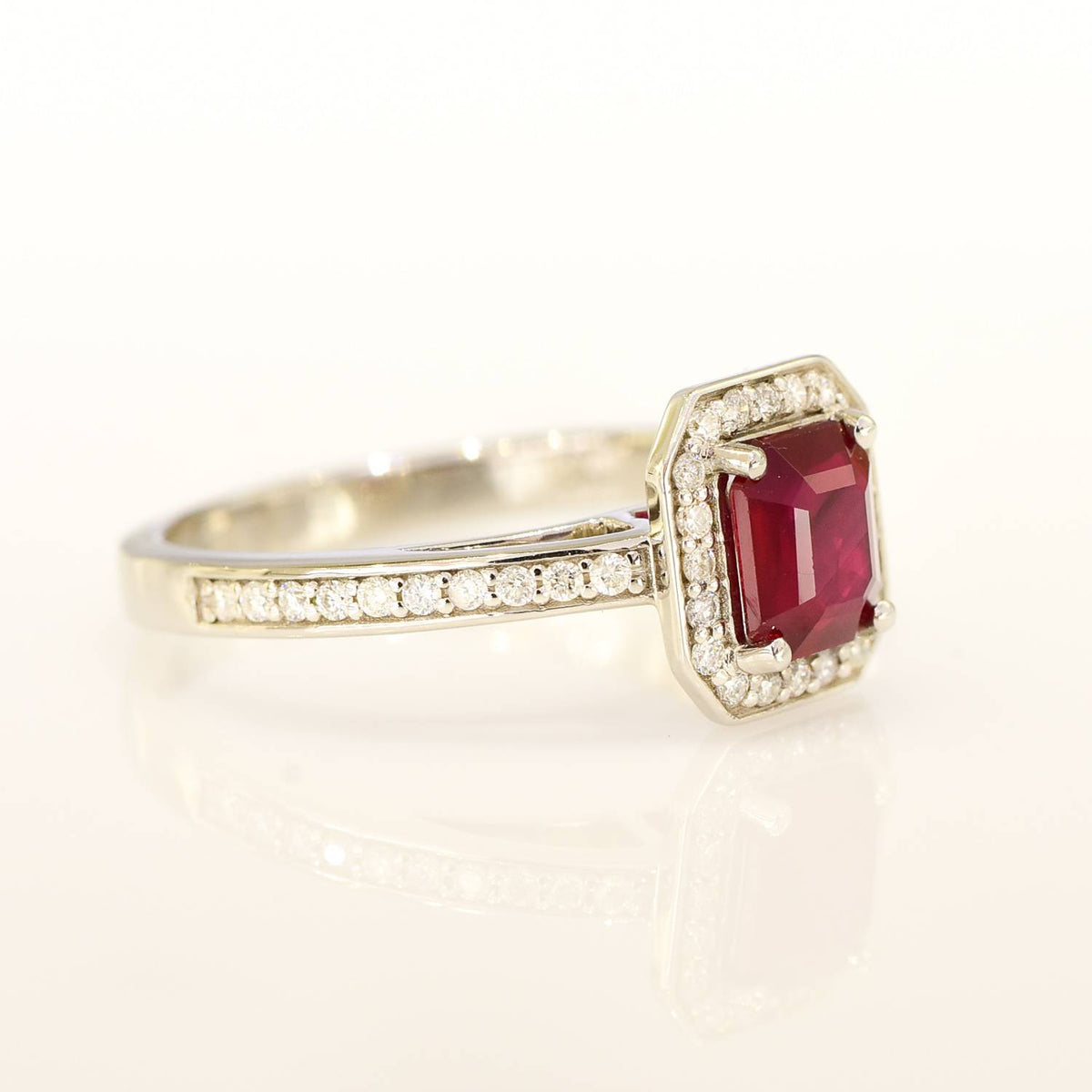 1.55ct Ruby and Diamond Halo Engagement Ring
