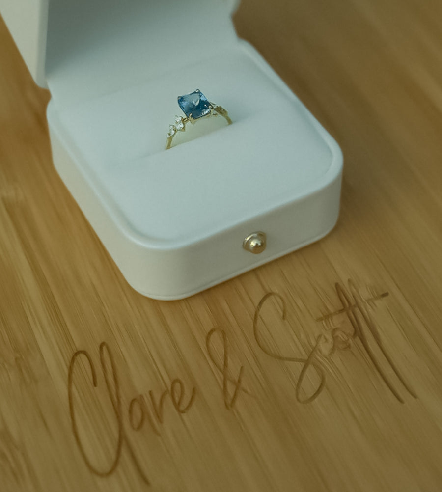 Blue Sapphire Diamond Ring Displayed in an Open Ring Box