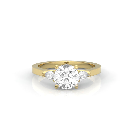 yellow gold ring with a round diamond on a white background