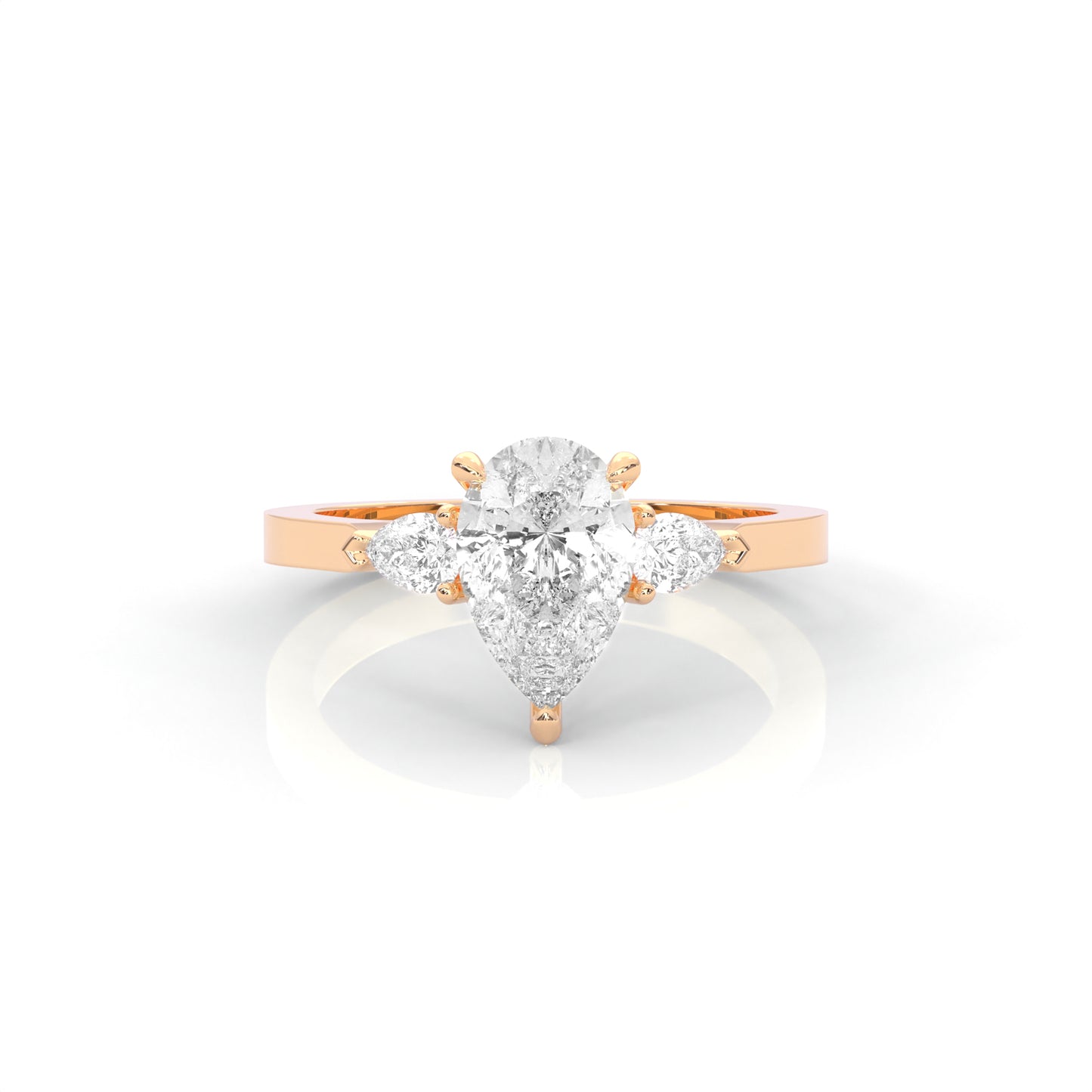 rose gold ring with a pear-shaped diamond on a white background