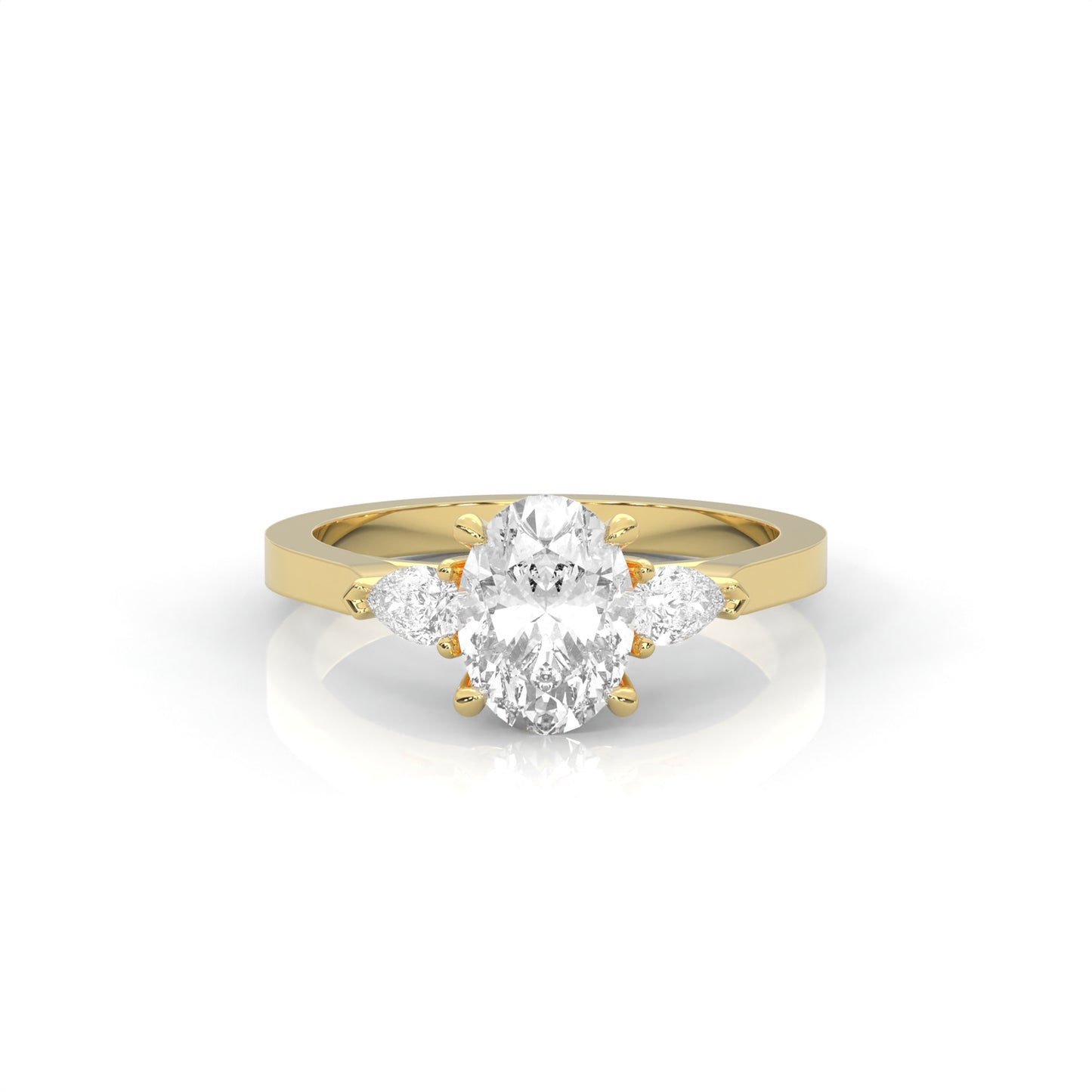 Yellow gold oval shape Diamond three stone diamond ring on a white background