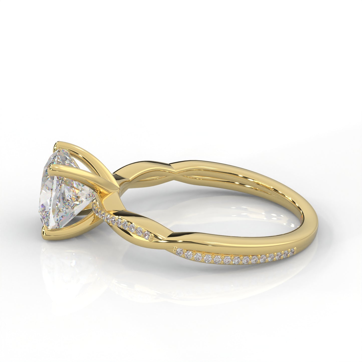 side view of yellow gold ring with diamond on a white background