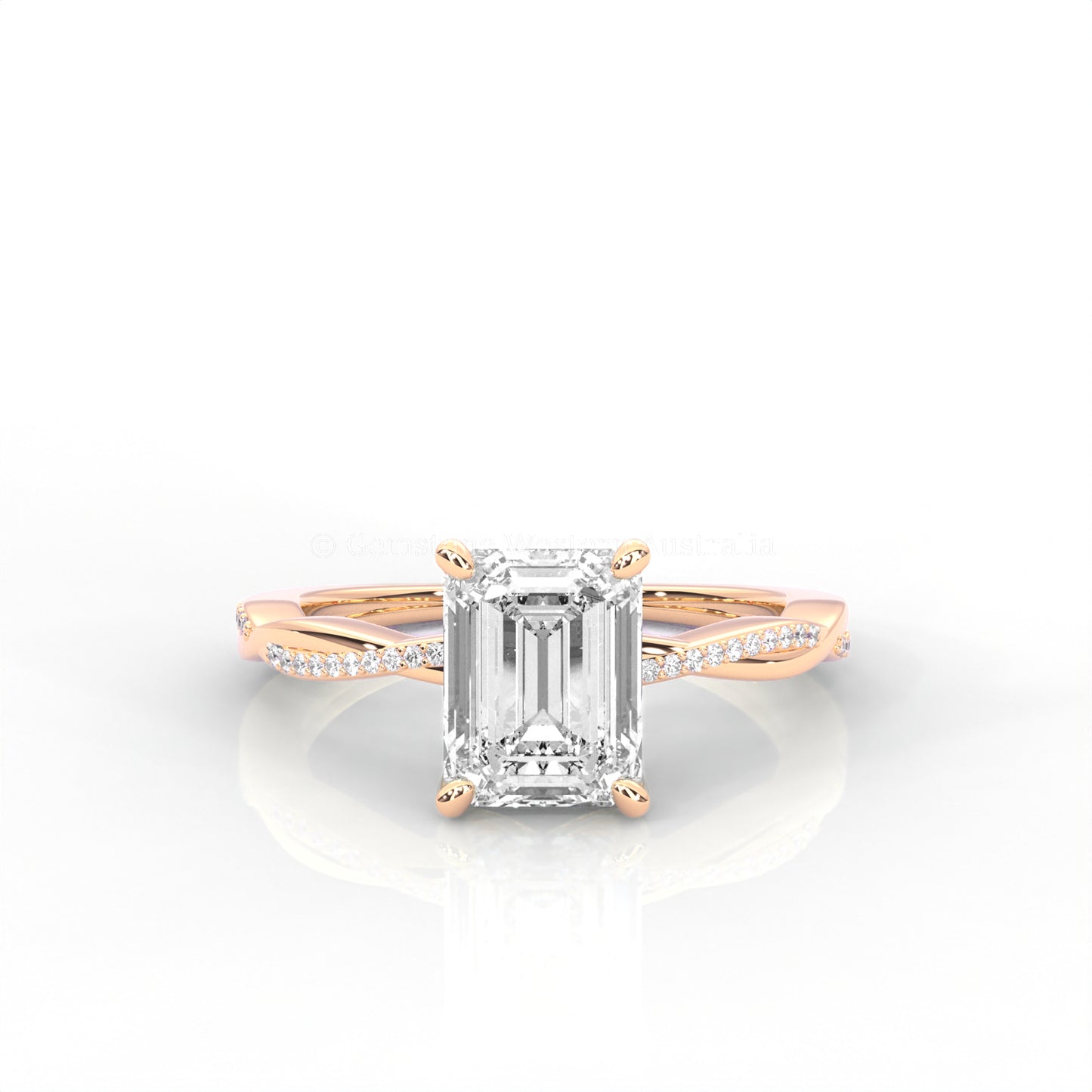 rose gold ring with emerald-cut diamond on a white background
