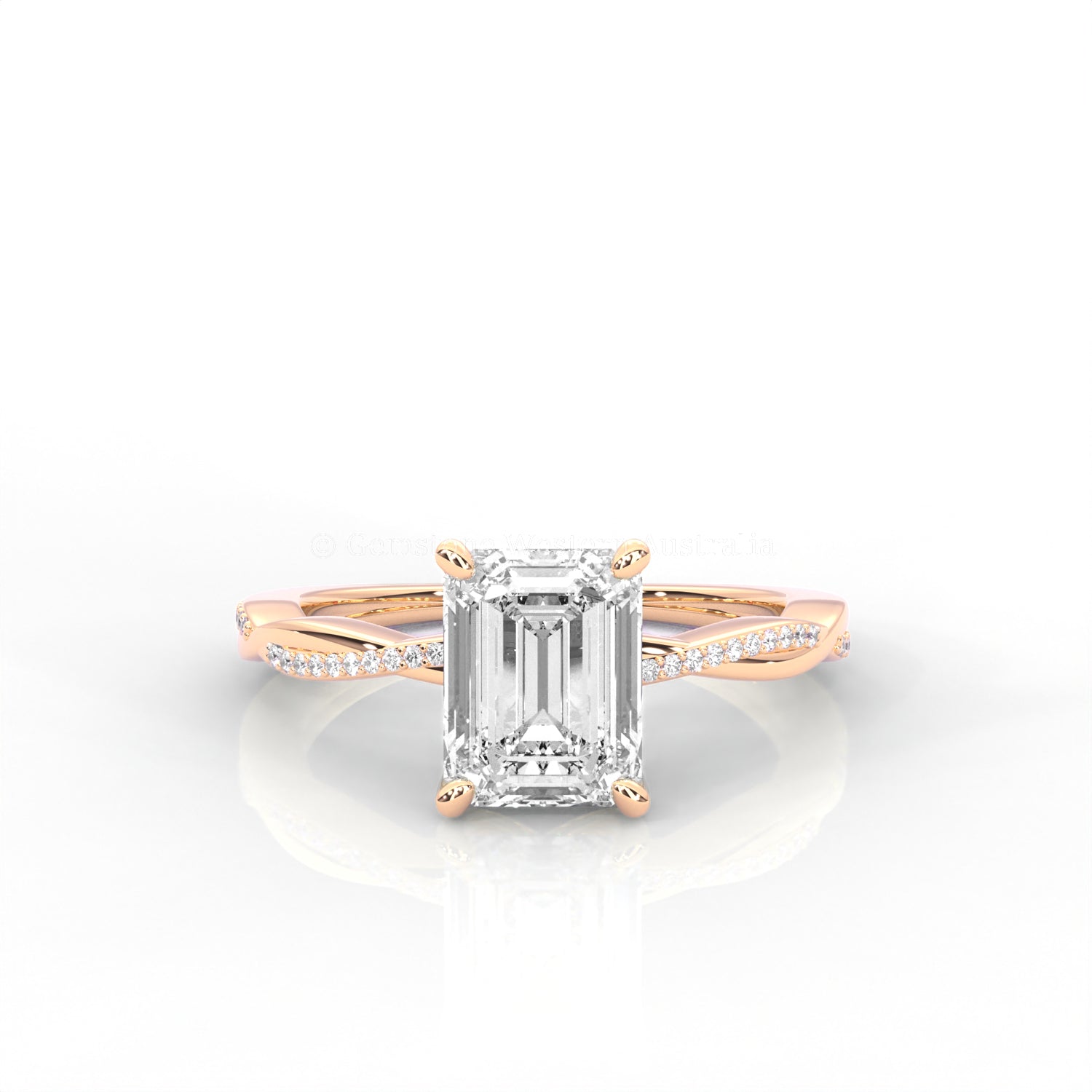 rose gold ring with emerald-cut diamond on a white background