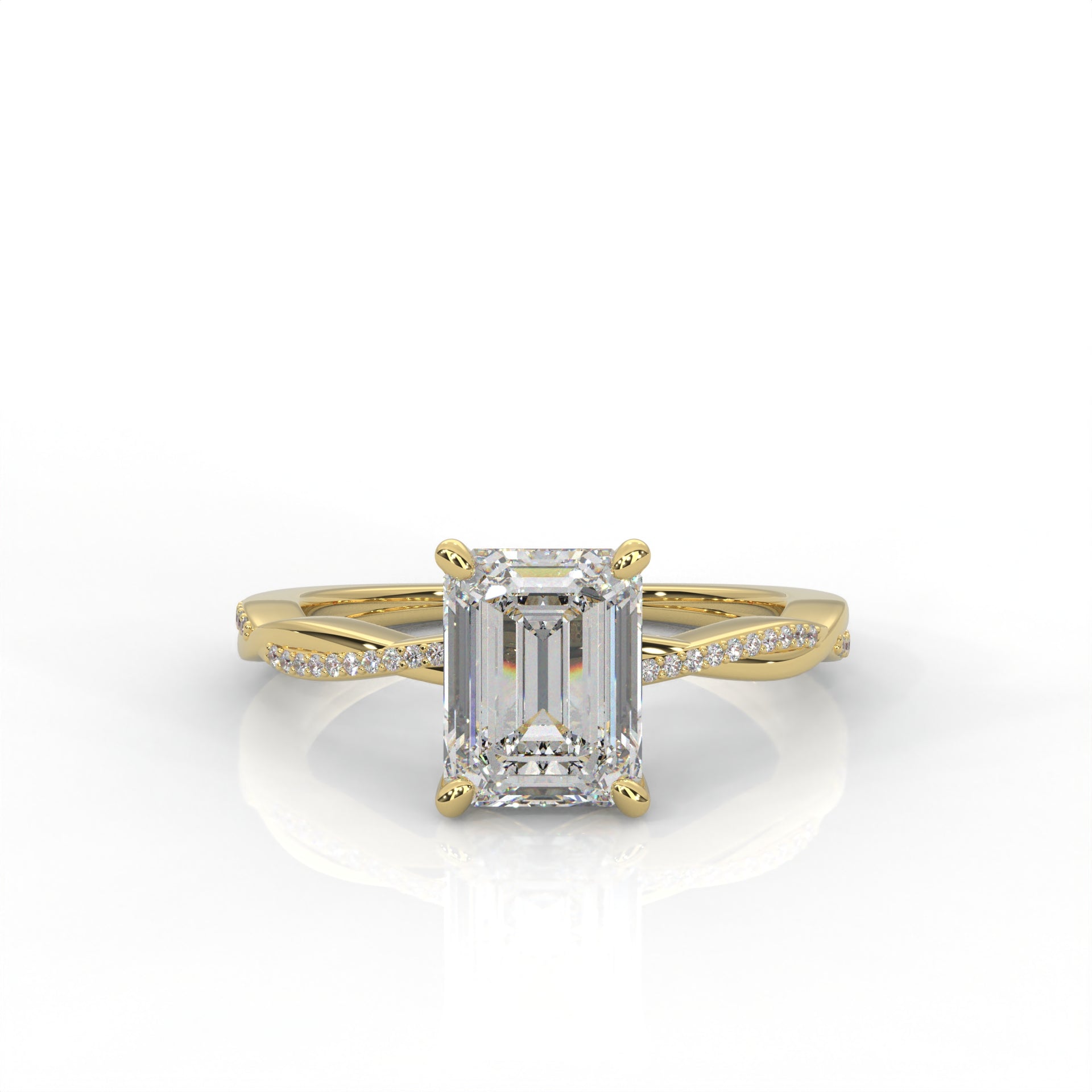 yellow gold ring with emerald-cut diamond on a white background