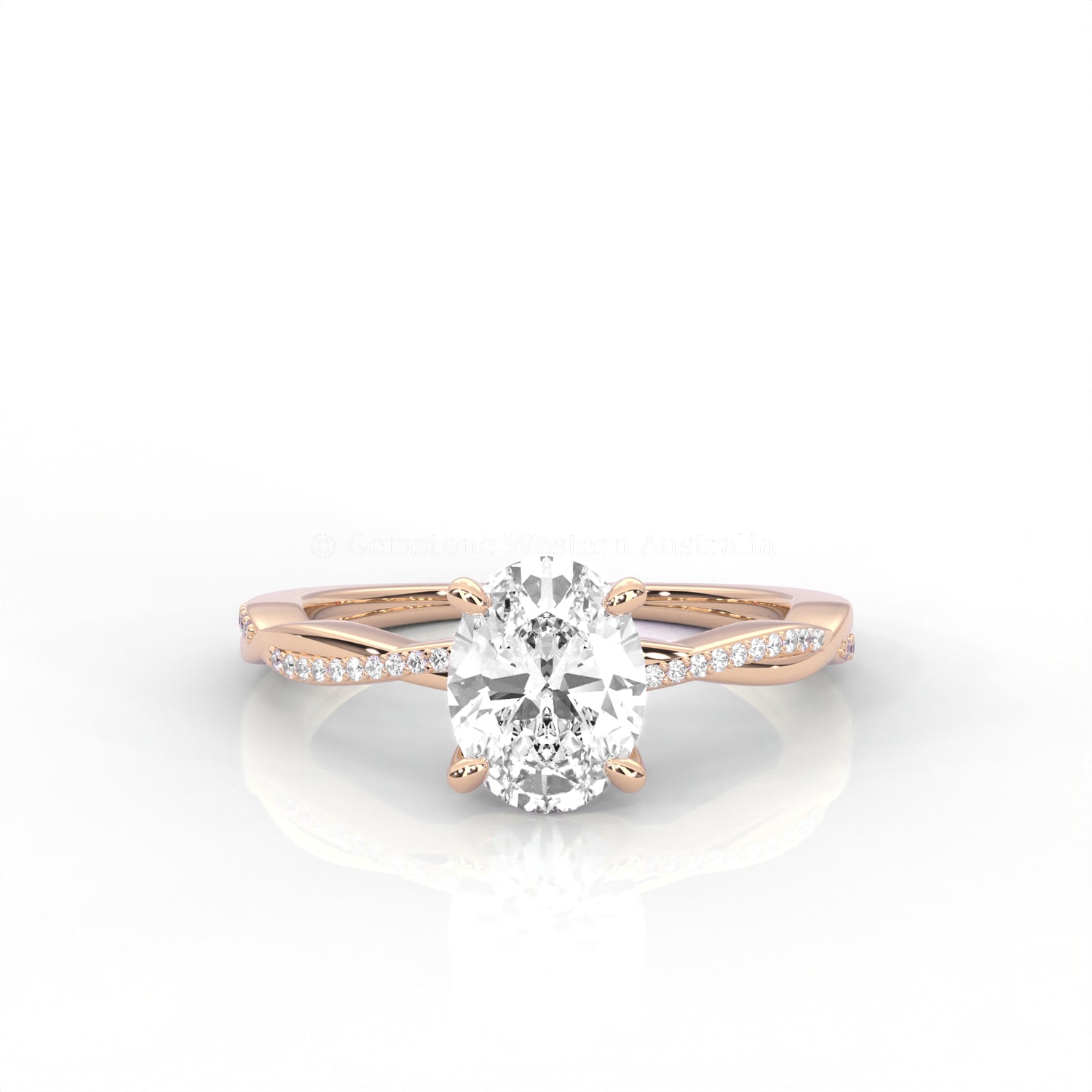 rose gold ring with an oval-shaped diamond and twisted band on a white background
