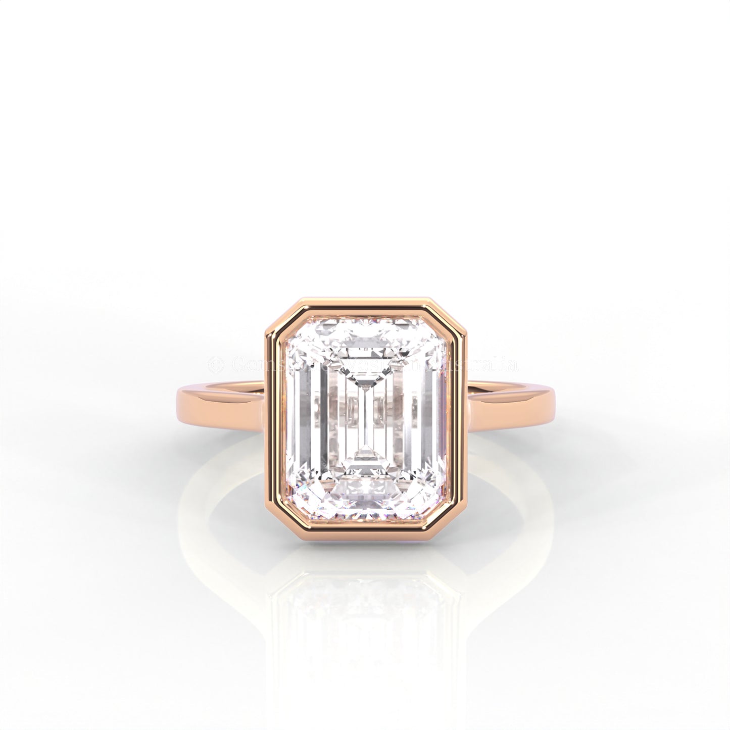bezel set emerald-cut diamond ring in rose gold