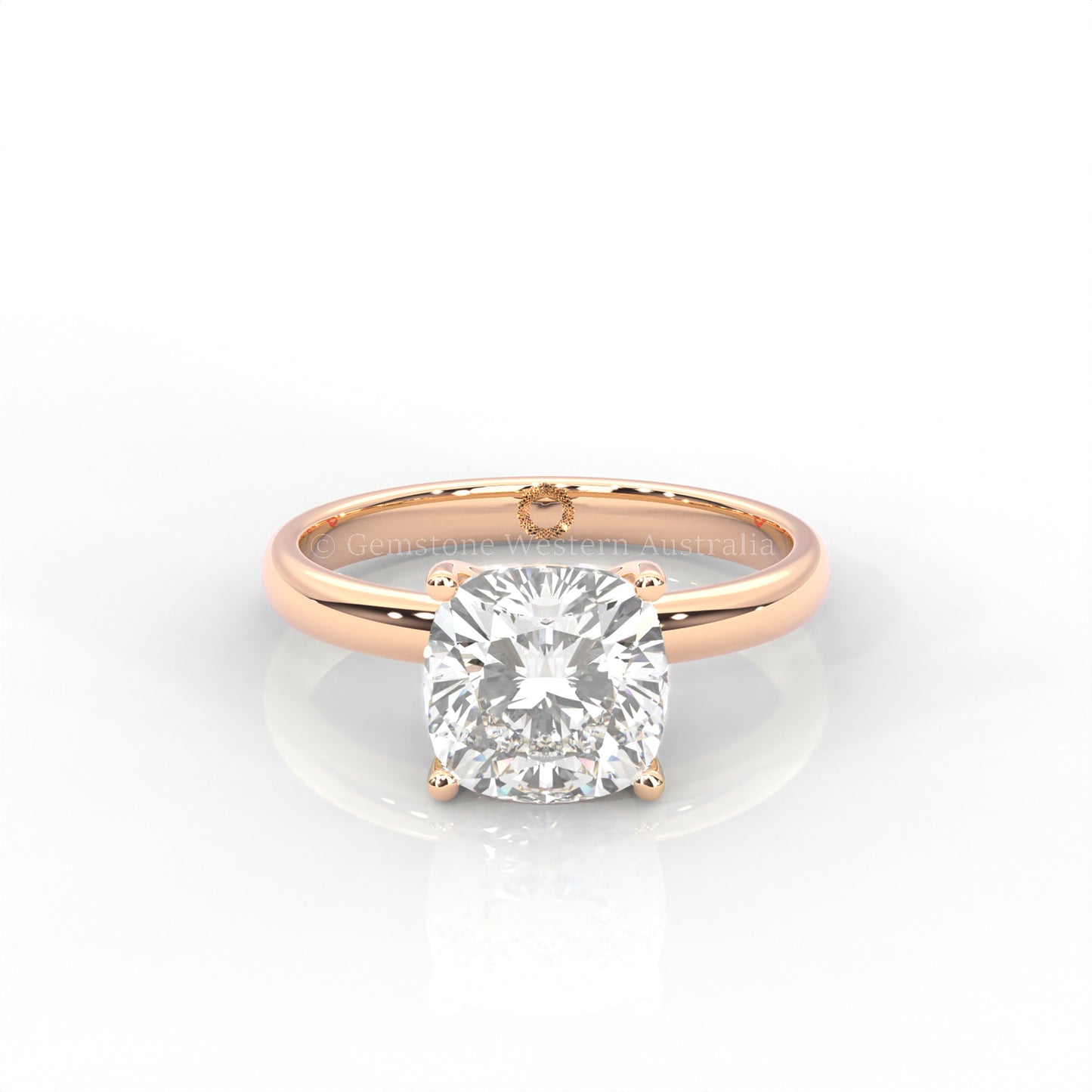 rose gold cushion-cut solitaire diamond ring in white background