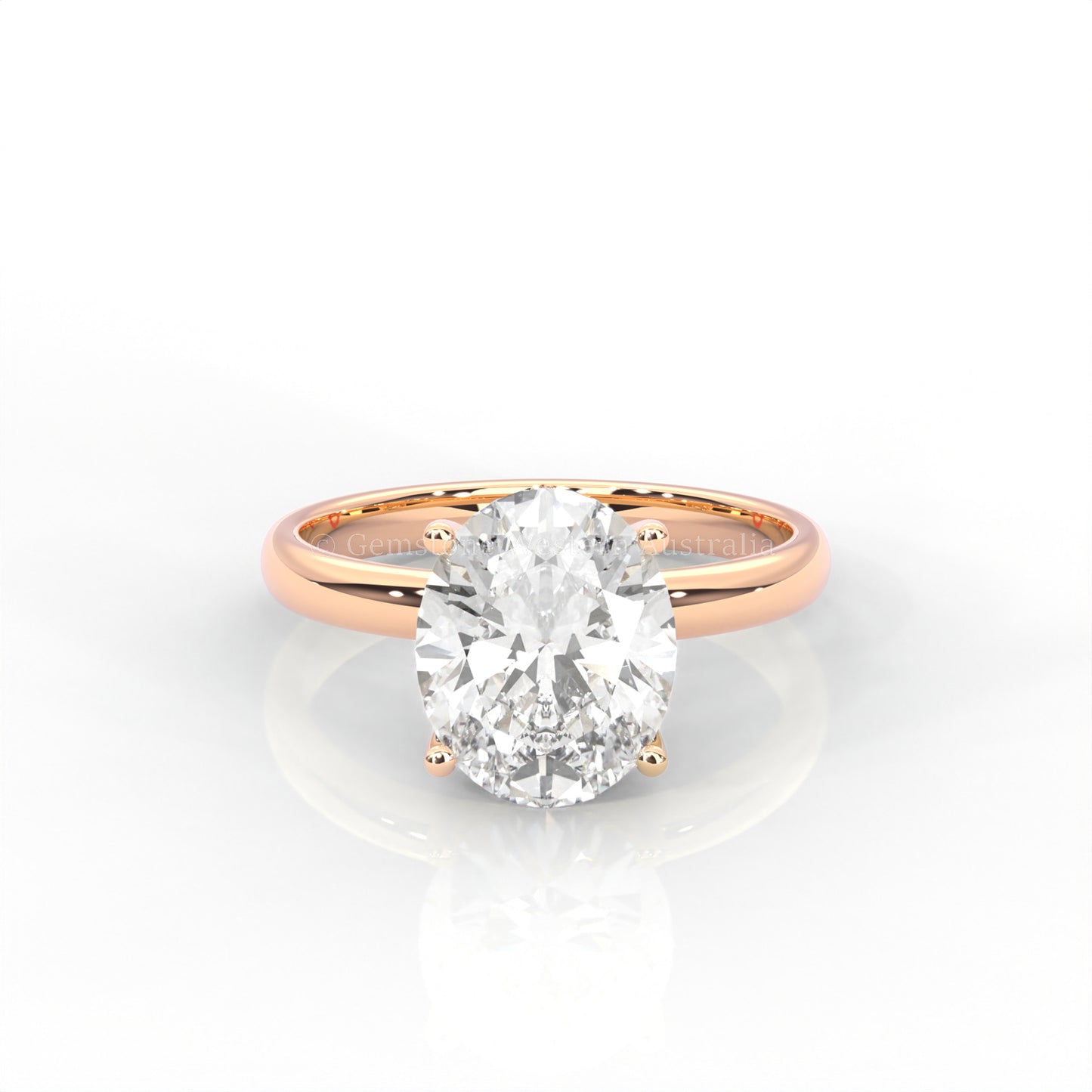 rose gold solitaire ring with oval-cut diamond in a white background