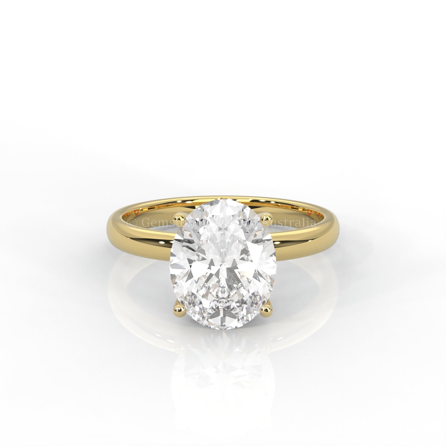 yellow gold solitaire ring with oval-cut diamond in a white background