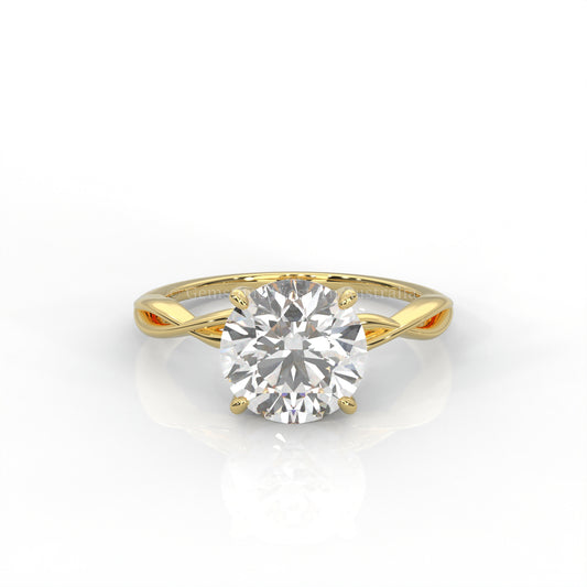 Yellow gold ring with round cut diamond and twisted band 