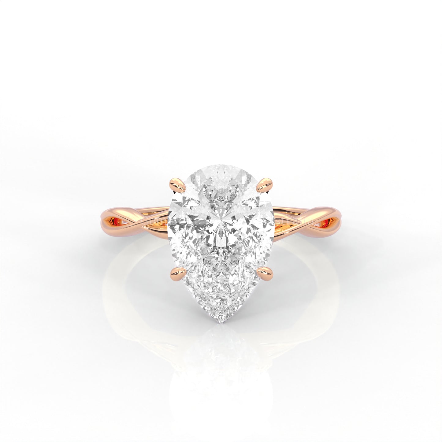 Rose gold ring with pear-cut diamond and twisted band 