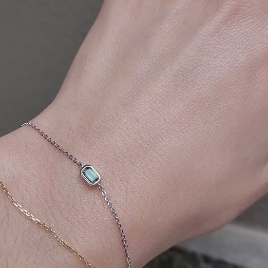 video on wrist of Australian Teal Sapphire Bracelet in Platinum 