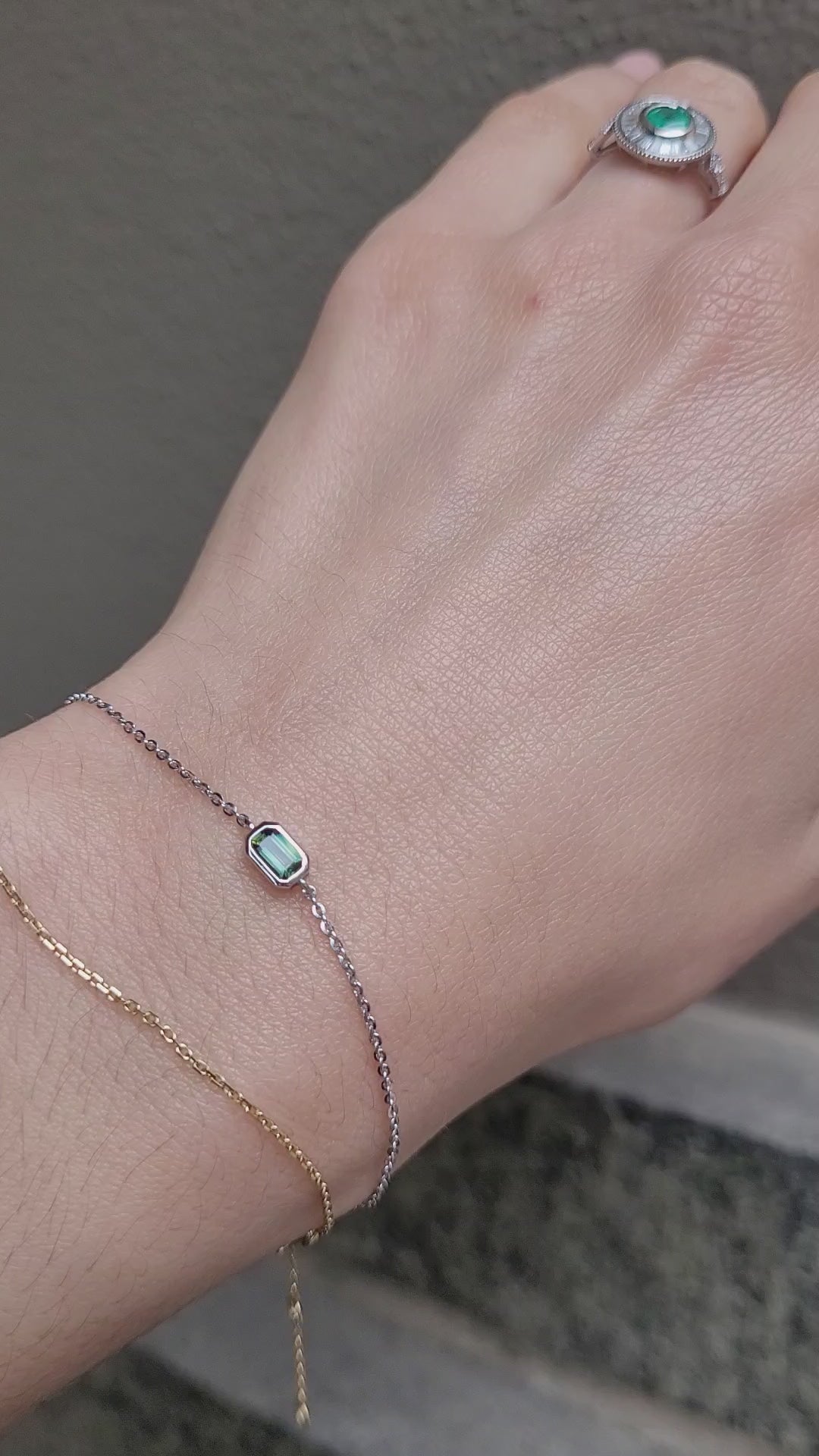 video on wrist of Australian Teal Sapphire Bracelet in Platinum 