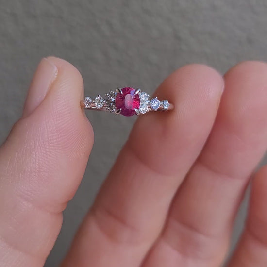 video of natural ruby and diamond ring in platinum 950 in neutral background