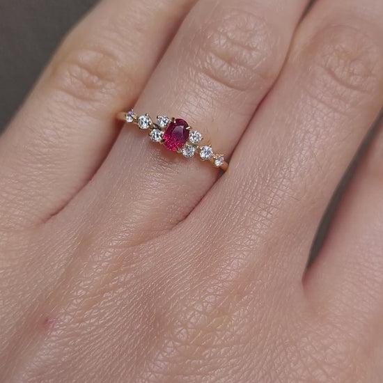 video of a Natural Ruby & Diamond Ring in 18K Yellow Gold worn on a hand in neutral background