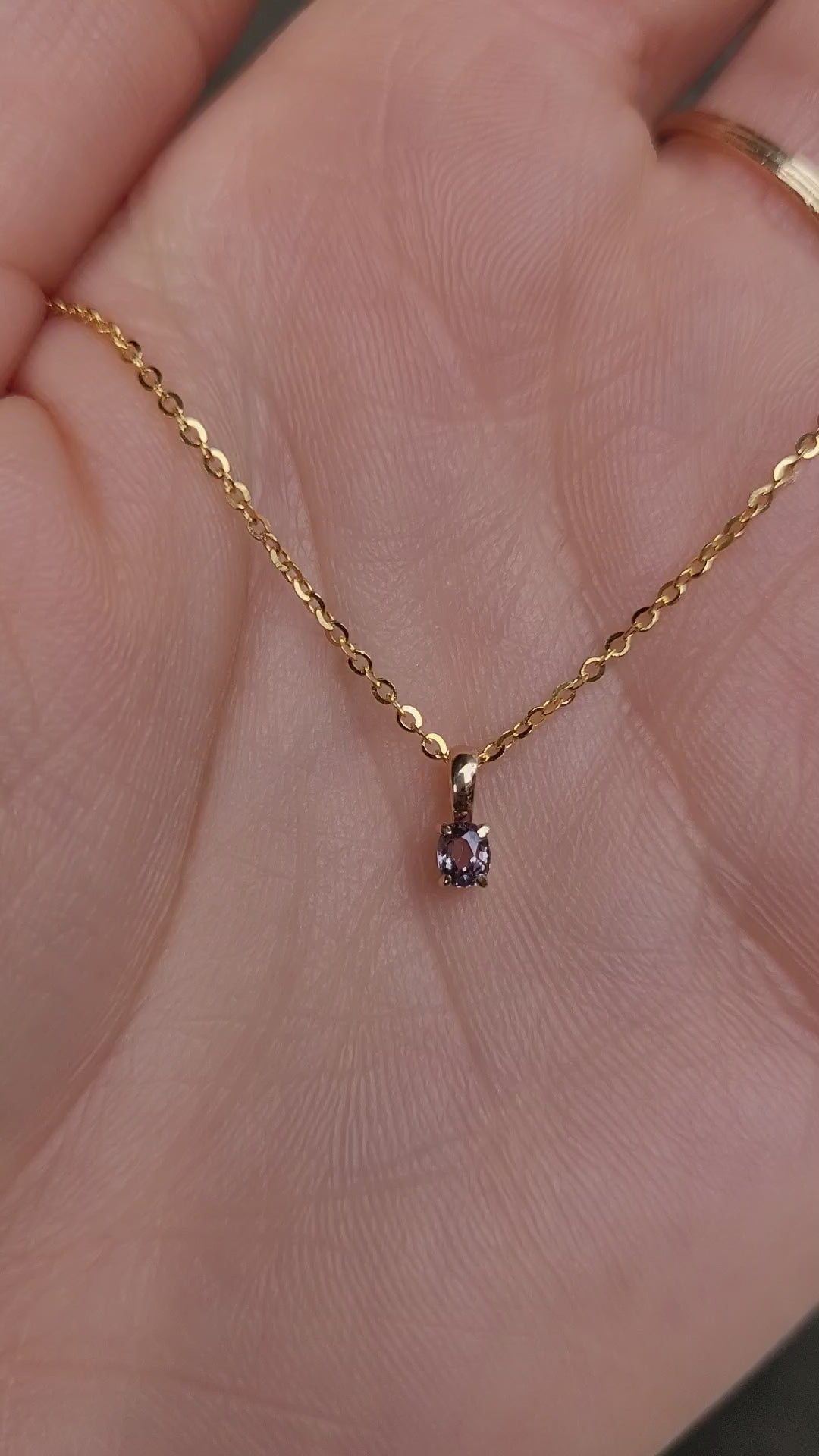 video of Petite Oval Alexandrite Pendant in 18K Yellow Gold – 0.16ct 
