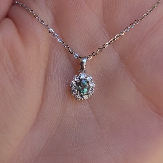 video of Natural Alexandrite Halo Pendant 0.43ct Oval Cut in Platinum 950 in neutral background
