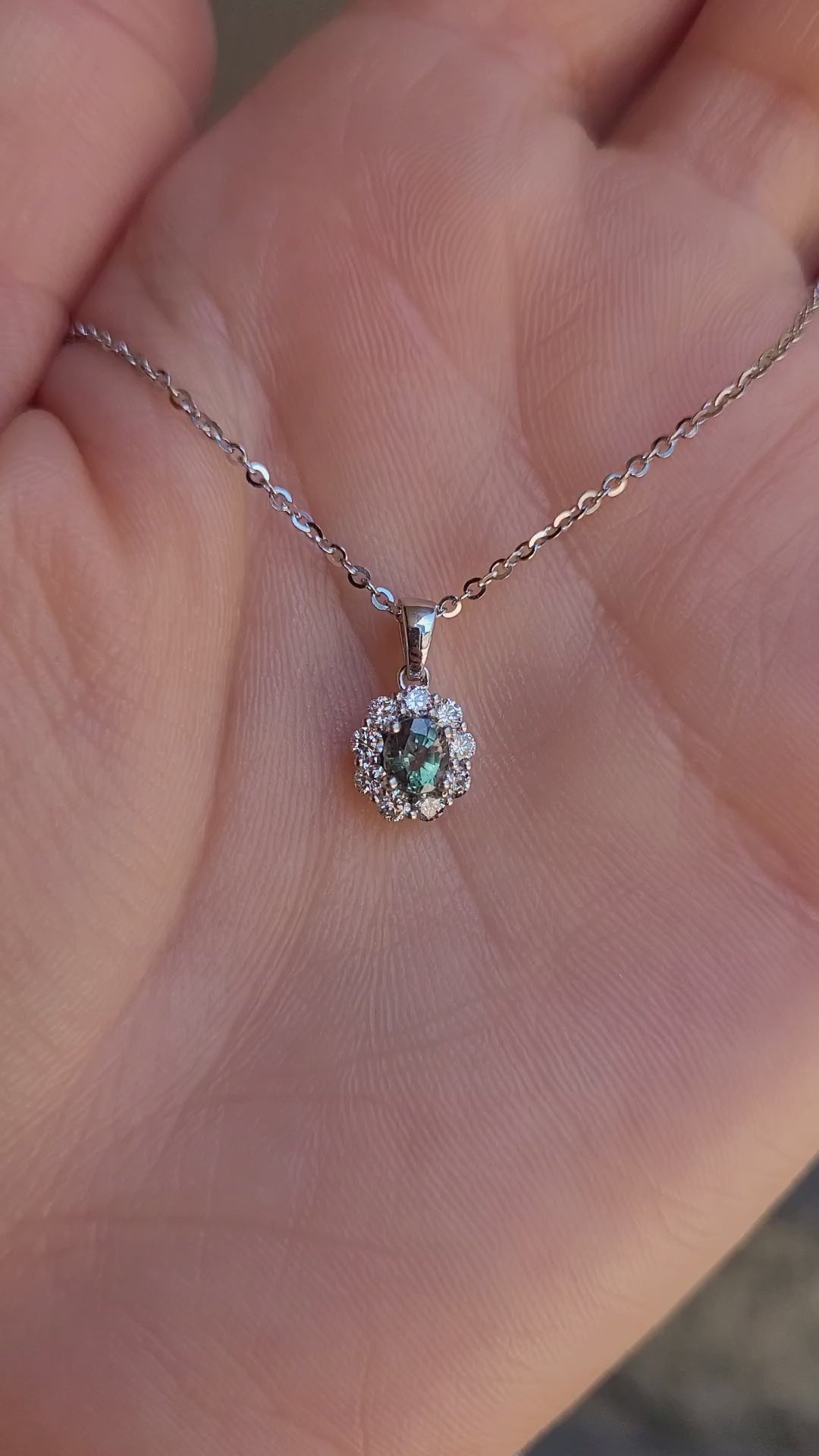 video of Natural Alexandrite Halo Pendant 0.43ct Oval Cut in Platinum 950 in neutral background