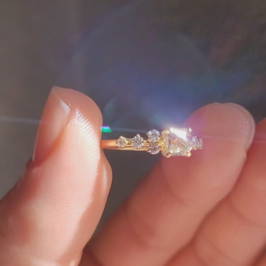 video on hand of of Natural Octagon Cut Alexandrite Ring 0.53ct with Diamond Accents in neutral background