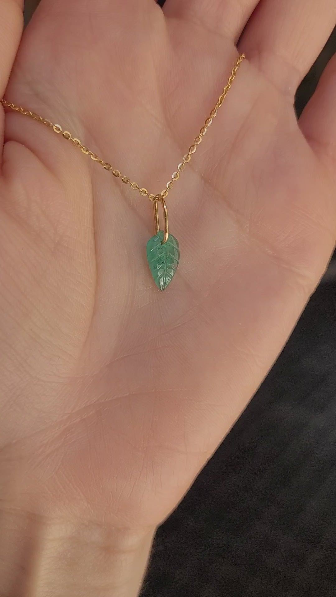 video on hand of Colombian Emerald Leaf Pendant 