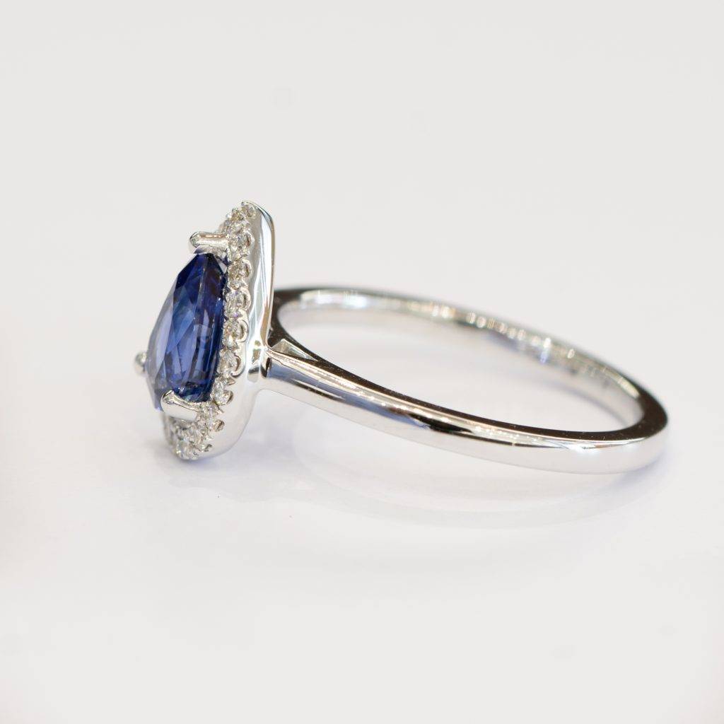 Pear Cut Natural Unheated Sapphire & Diamond Halo Ring in 18K Gold