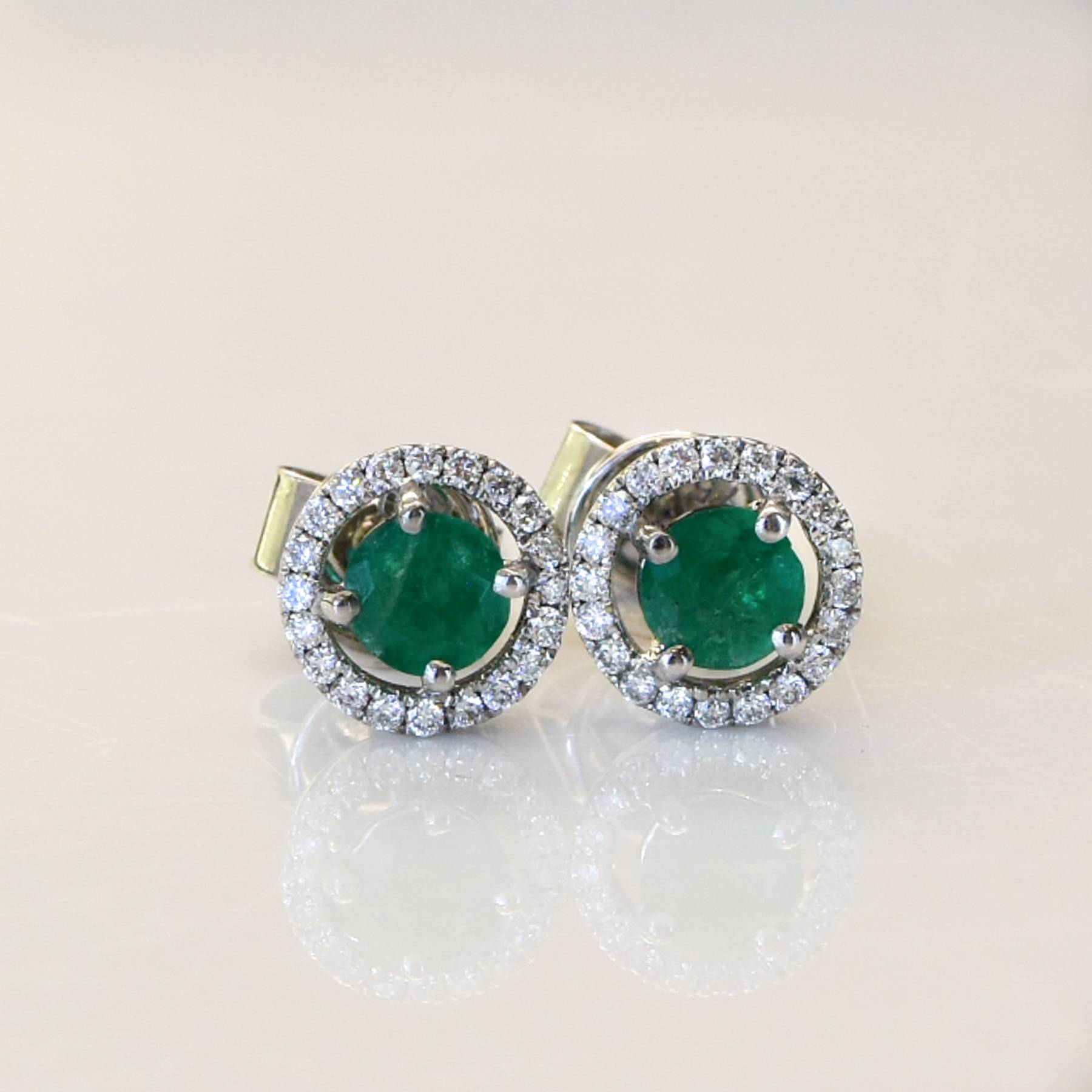 0.70ct Colombian Emerald And Diamond Stud Earrings In 18K White Gold