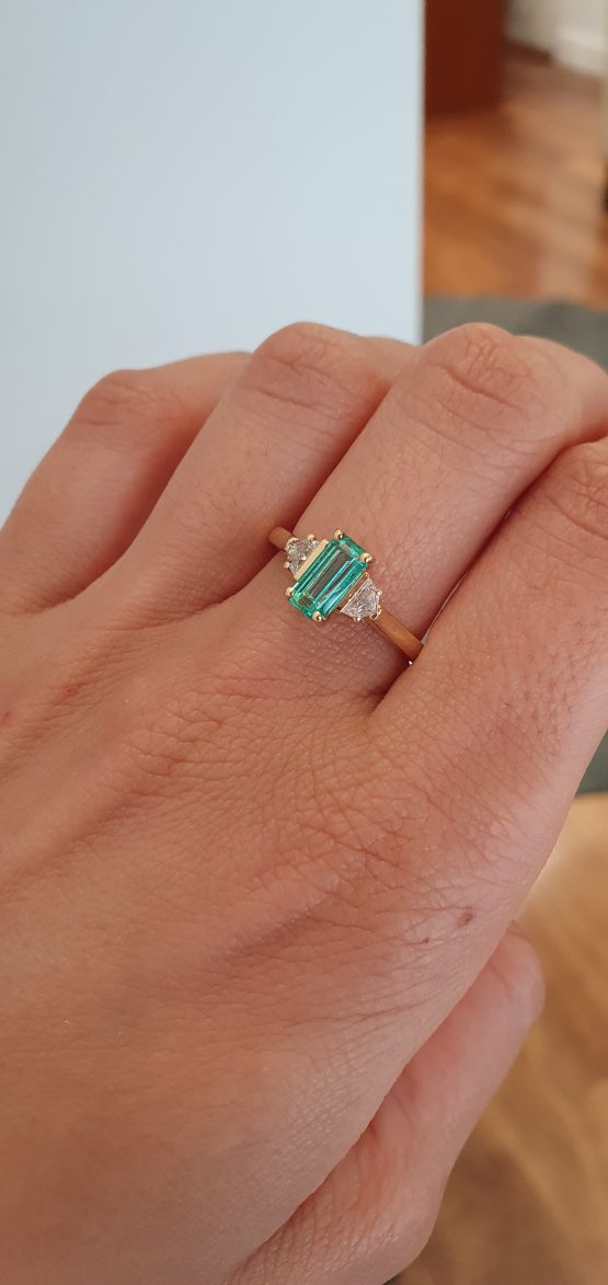 View on hand of Natural Colombian Emerald and Cadillac Diamond Ring in 18K Yellow Gold – 1.13ct Elongated Emerald Cut - 1982782