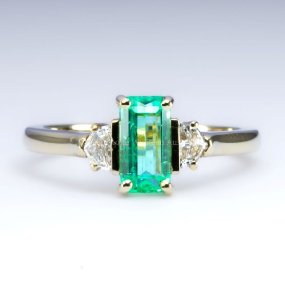 Front view of Natural Colombian Emerald and Cadillac Diamond Ring in 18K Yellow Gold – 1.13ct Elongated Emerald Cut - 1982782