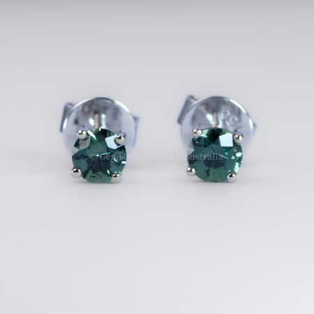 front view of Australian Teal Sapphire Stud Earrings in 18K White Gold – 0.58ct Round Cut - 1982779