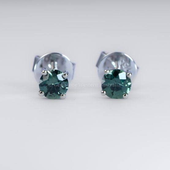 front view of Australian Teal Sapphire Stud Earrings in 18K White Gold – 0.58ct Round Cut - 1982779