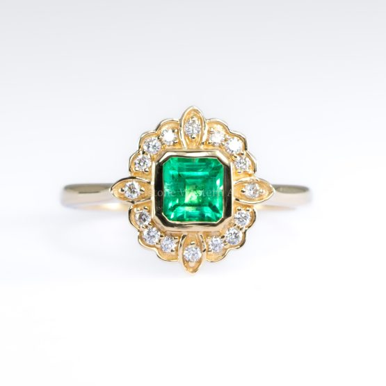 front view of Art Deco Inspired Colombian Emerald Ring with Diamond Halo in 18K Yellow Gold