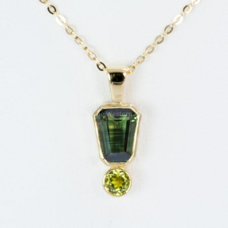 close up front view of Australian Sapphire Pendant in 18K Yellow Gold on display neck- 1982794