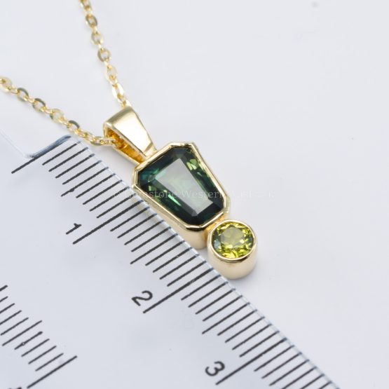 view of size of Australian Sapphire Pendant in 18K Yellow Gold in contrast with a ruler- 1982794