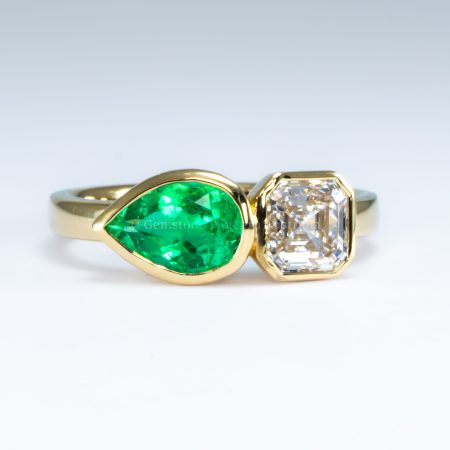 front view of toi et moi ring with 1ct natural diamond and 1ct Colombian emerald