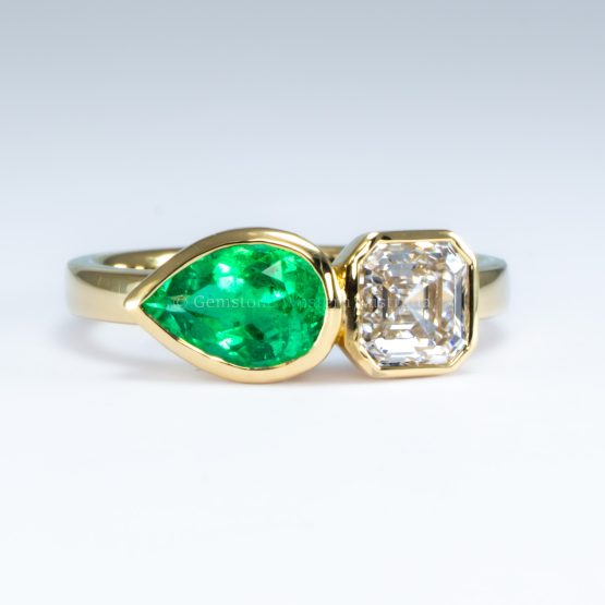 front view of toi et moi ring with 1ct natural diamond and 1ct Colombian emerald