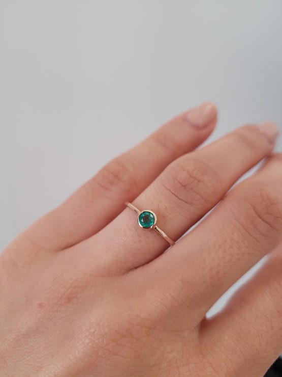 photo on hand of Delicate 9K Rose Gold Ring with 3.7mm Round Natural Colombian Emerald - 1982813