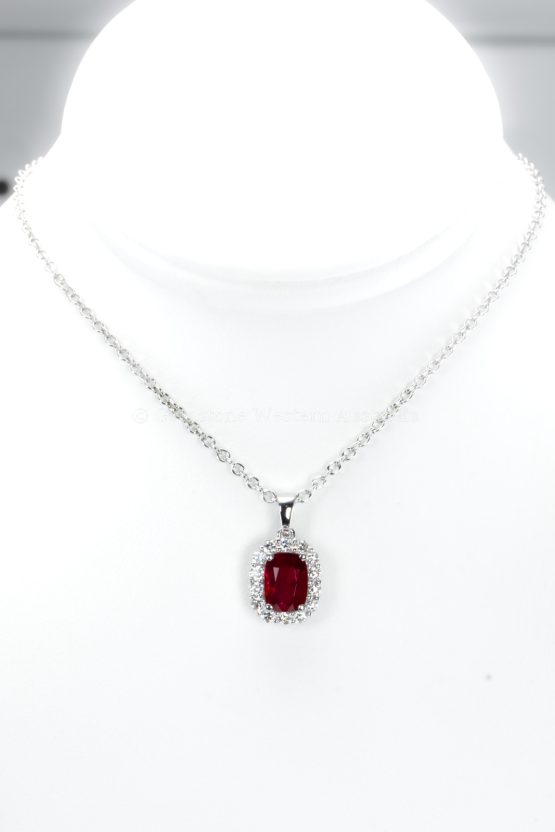 view on display neck of of 1.05ct Natural Unheated Ruby Pendant with Diamond Halo in Platinum 950 -