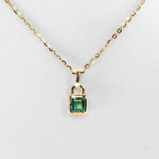 front view of 0.33ct Vivid Green Colombian Emerald Pendant in 18K Yellow Gold